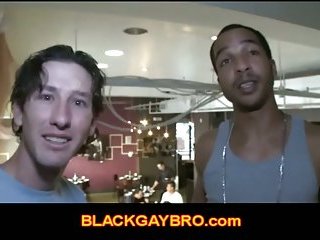 Black bro gives white guy a public blowjob in restaurant
