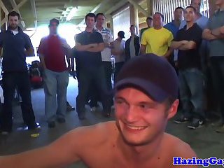 student sucking in group initiation