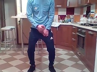 Twink cranks his meat in the kitchen