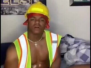 A muscular black gay man jerks off a big Dick at home