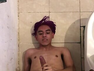 Purple-haired latino twink eating his own cum