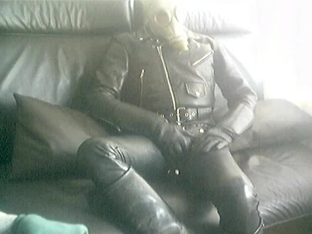 Dude In Leather Clothes &amp; Gas Mask Abusing Himself